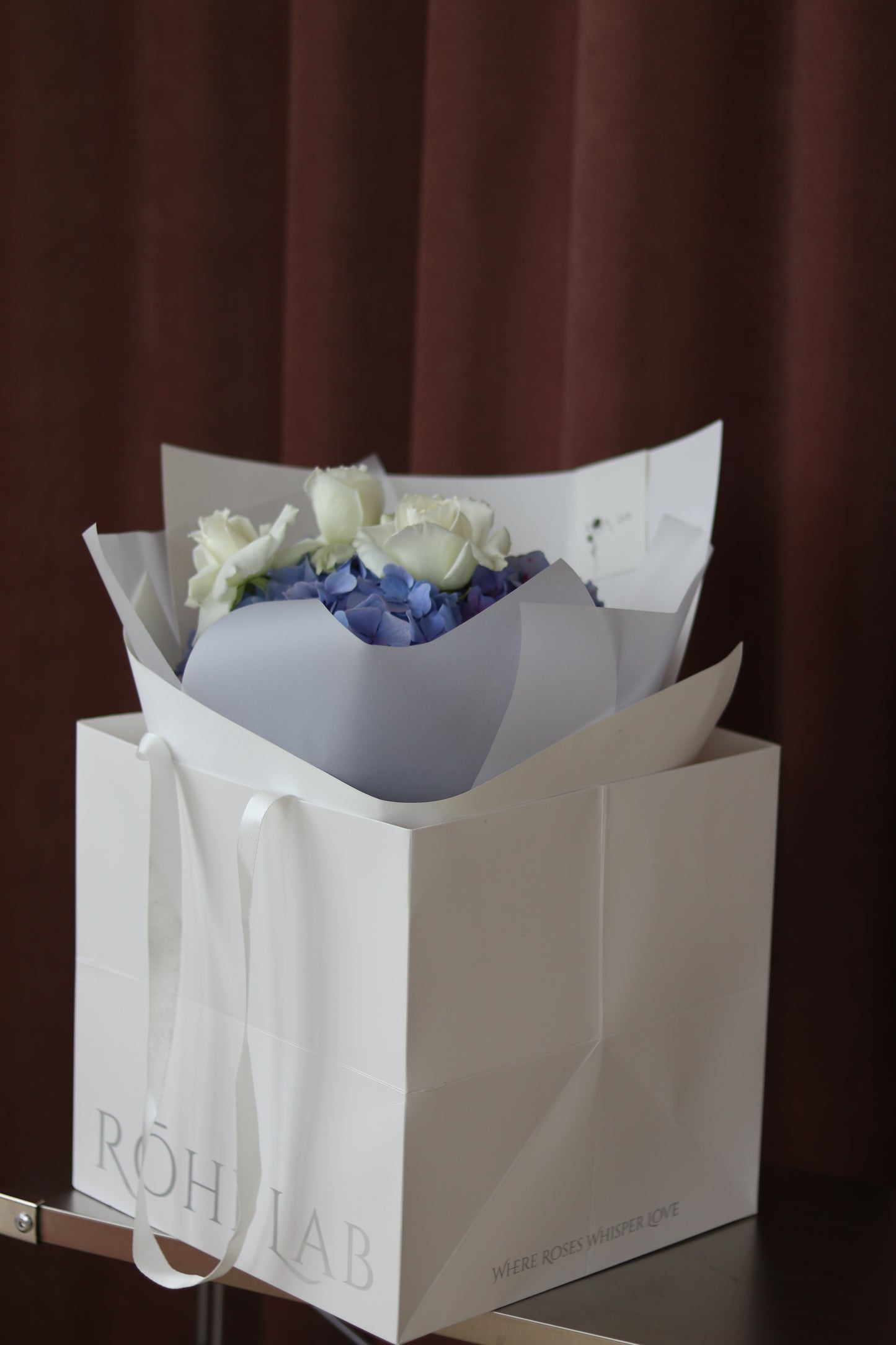 Soft Bloom bouquet presented in Rōhi Lab signature packaging