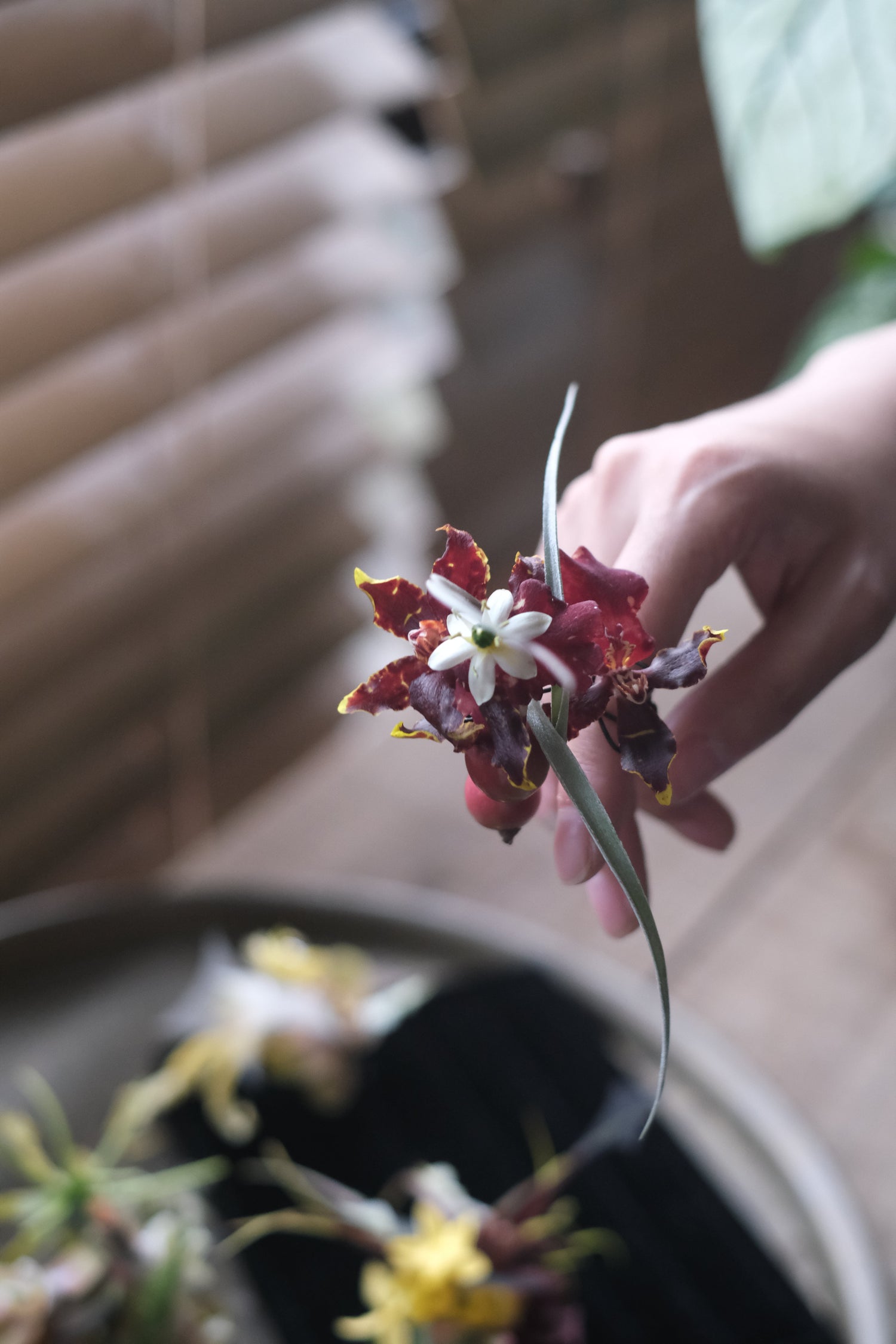 Custom ring flower floral design featuring a sculptural centre and deep red petals, created as a bespoke symbolic piece
