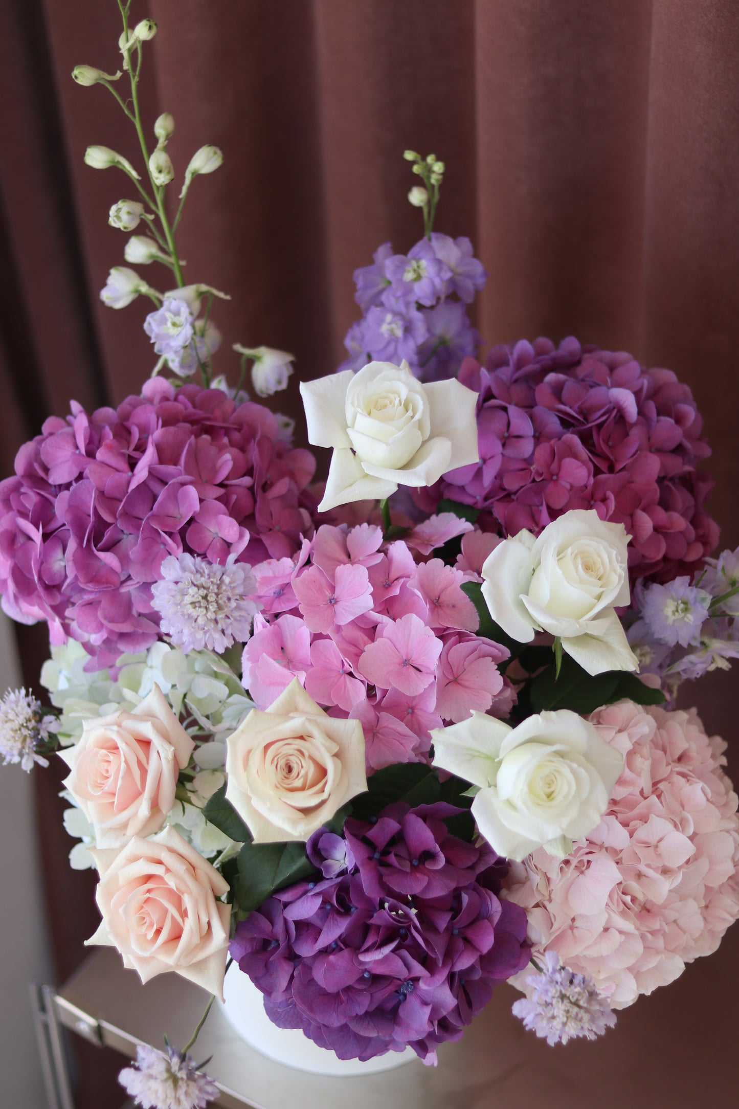 Pink Garden arrangement with blush pink flowers and ivory accents in a soft colour palette