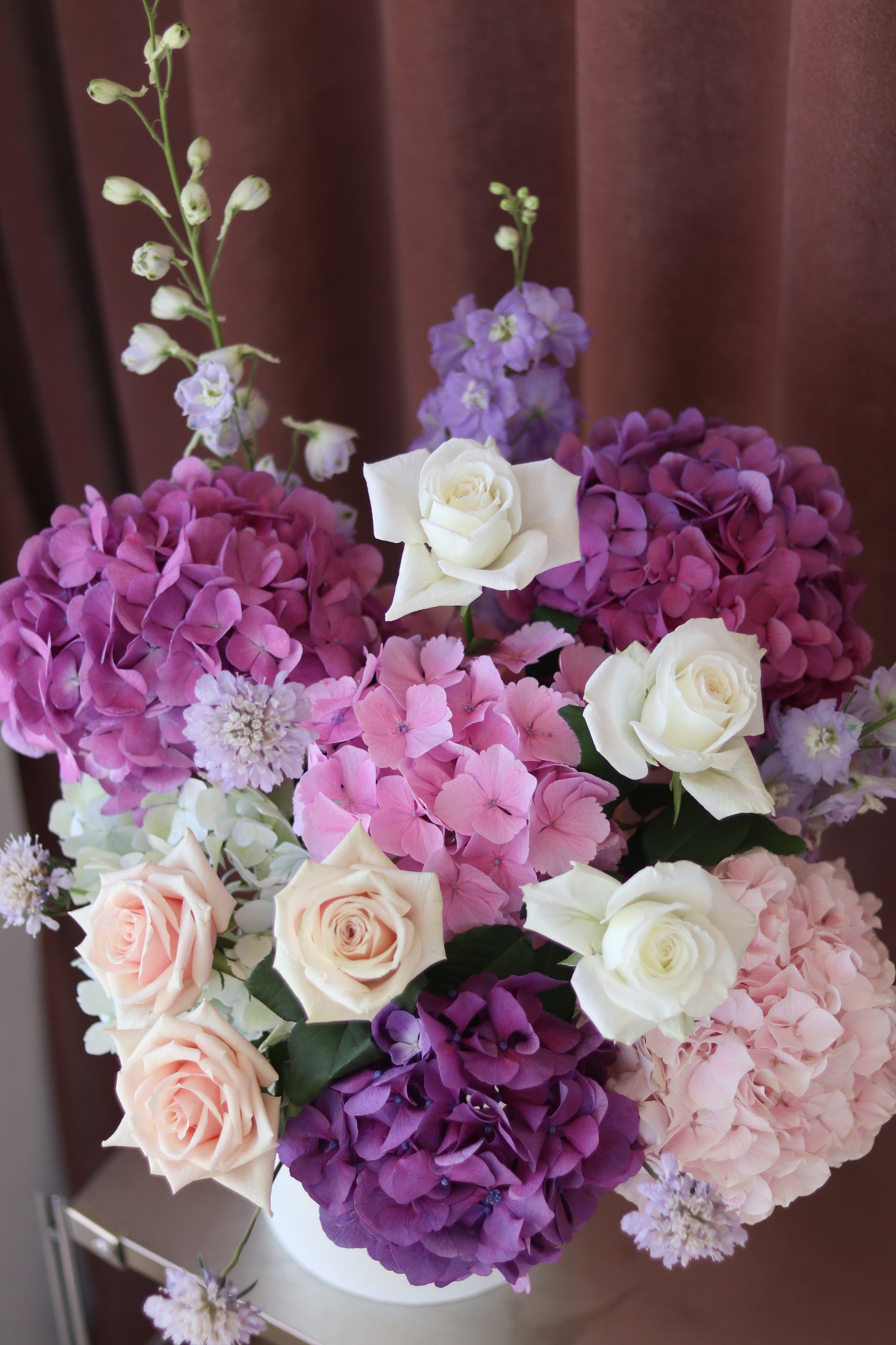 Pink Garden arrangement with blush pink flowers and ivory accents in a soft colour palette