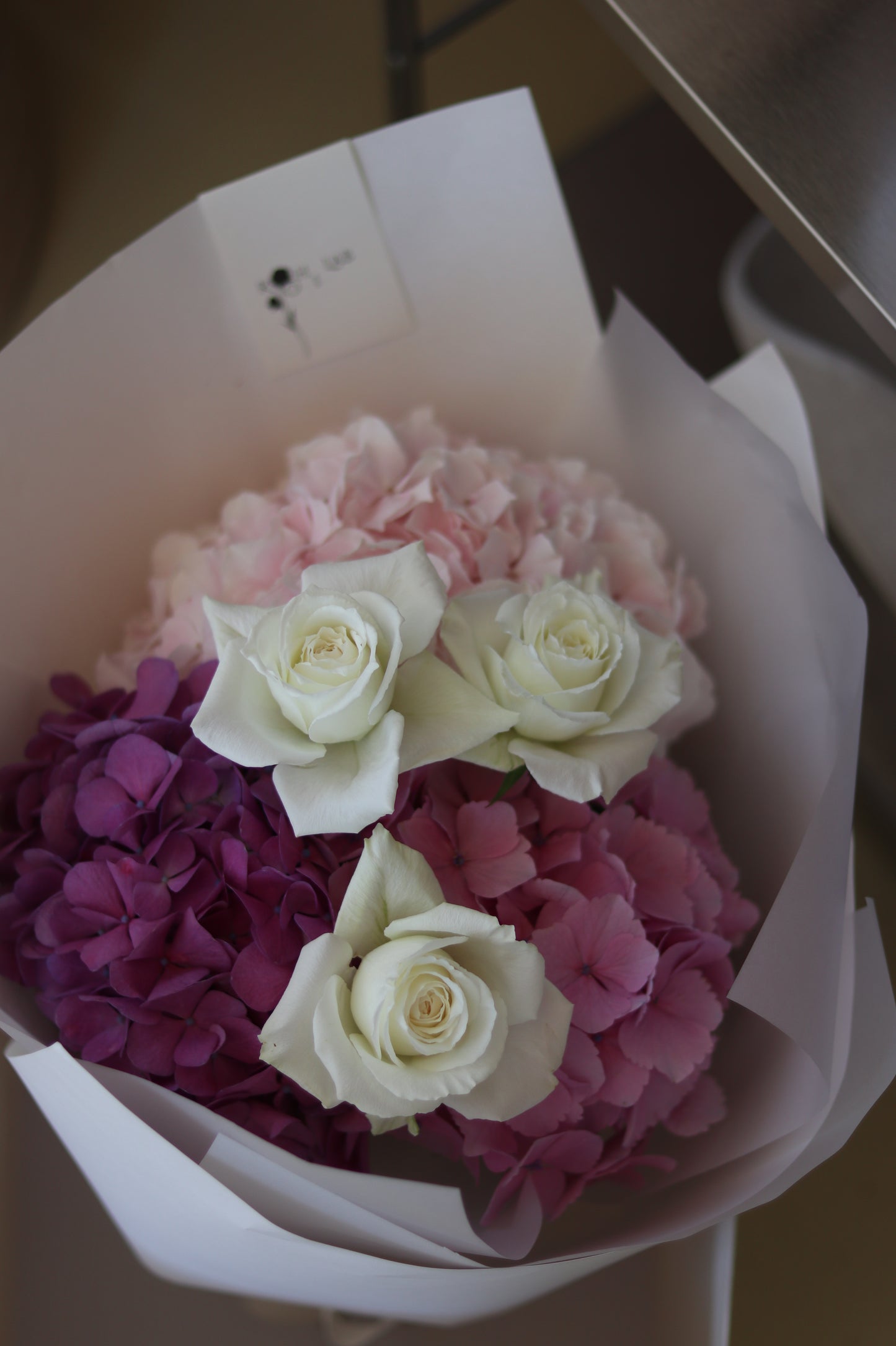 Soft blush hydrangea bouquet with ivory roses