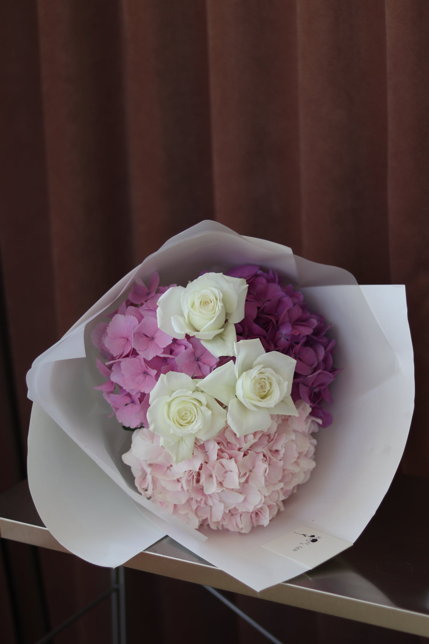 Soft Bloom blush hydrangea and ivory rose bouquet by Rōhi Lab
