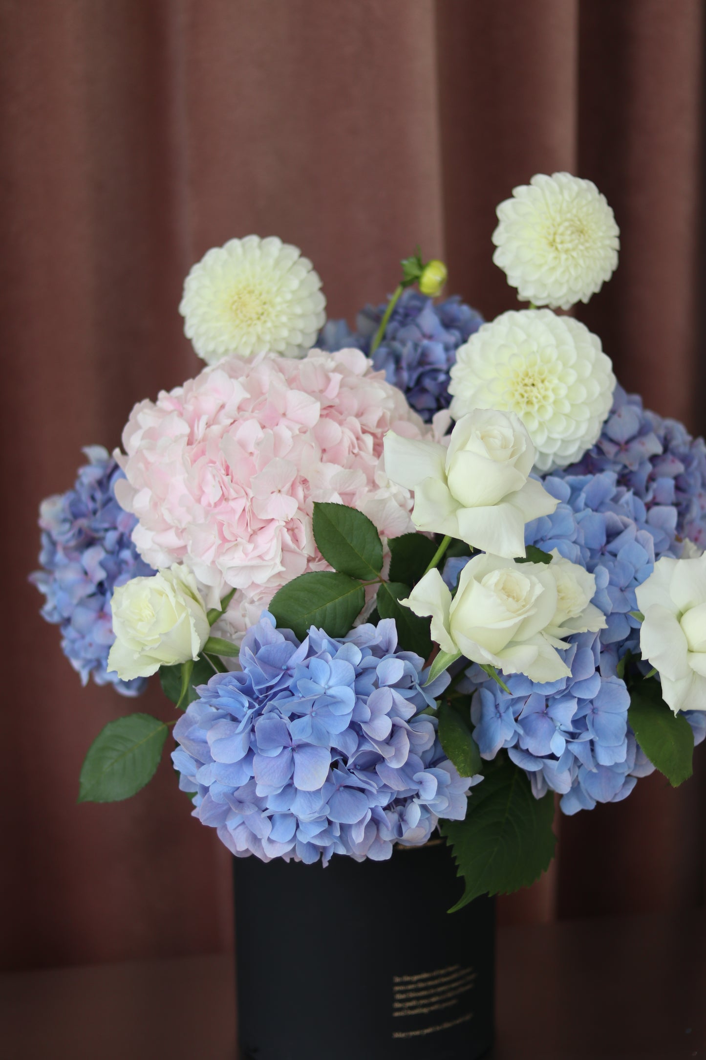 Elegant pastel hydrangea flower arrangement styled for calm and thoughtful gifting