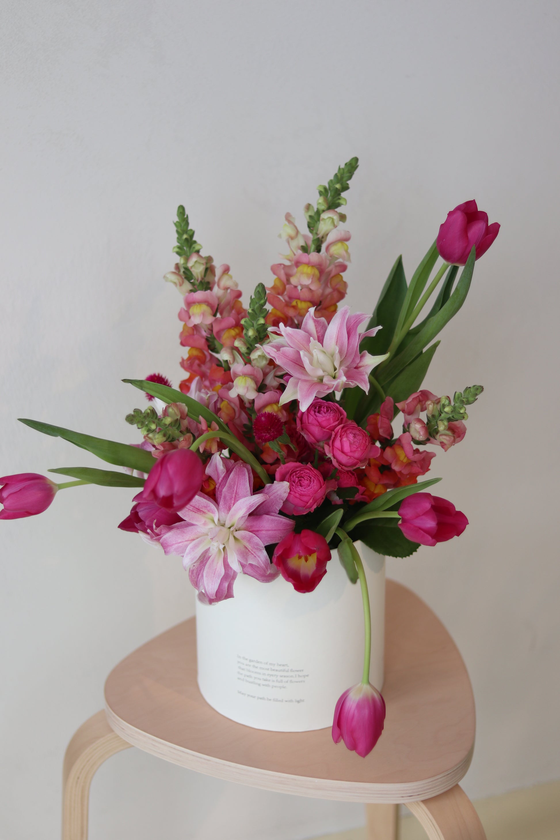 Joyful floral bucket arrangement Auckland
