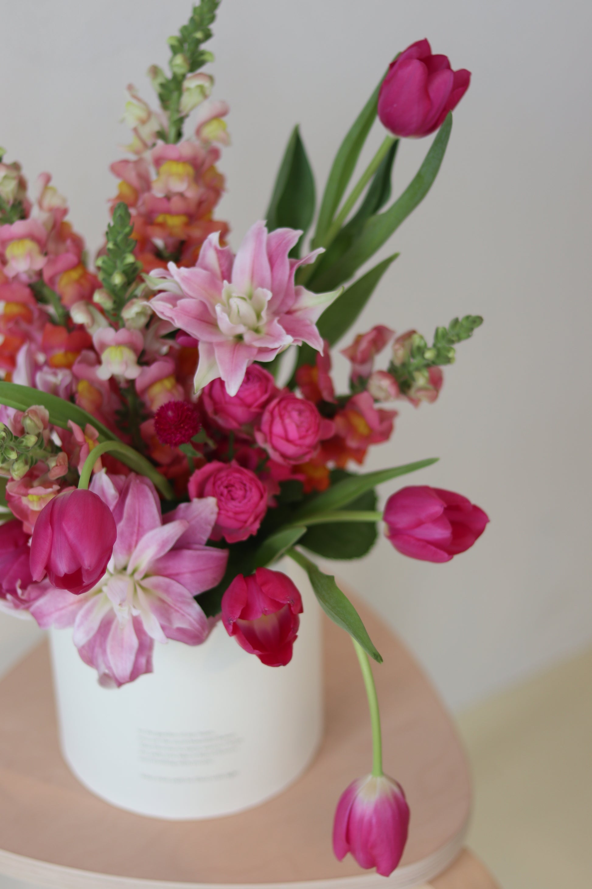 Seasonal pink flowers in vase Auckland