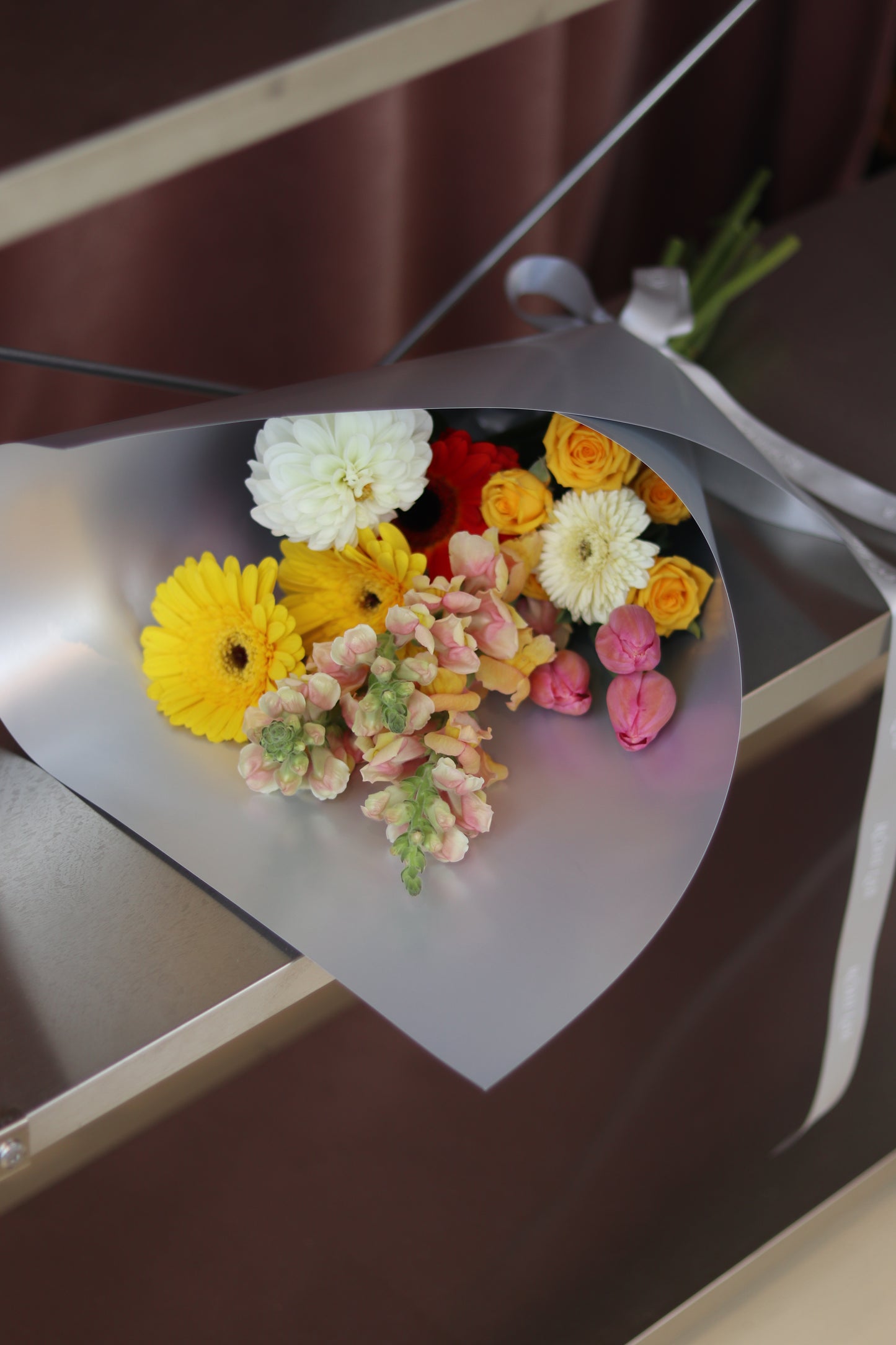 Bright graduation flowers for Auckland delivery
