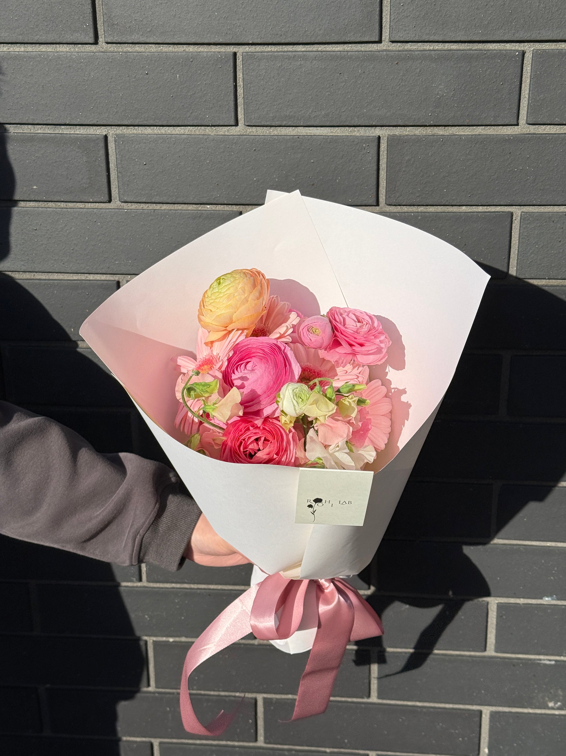 Seasonal ranunculus bouquet featuring delicate layered petals