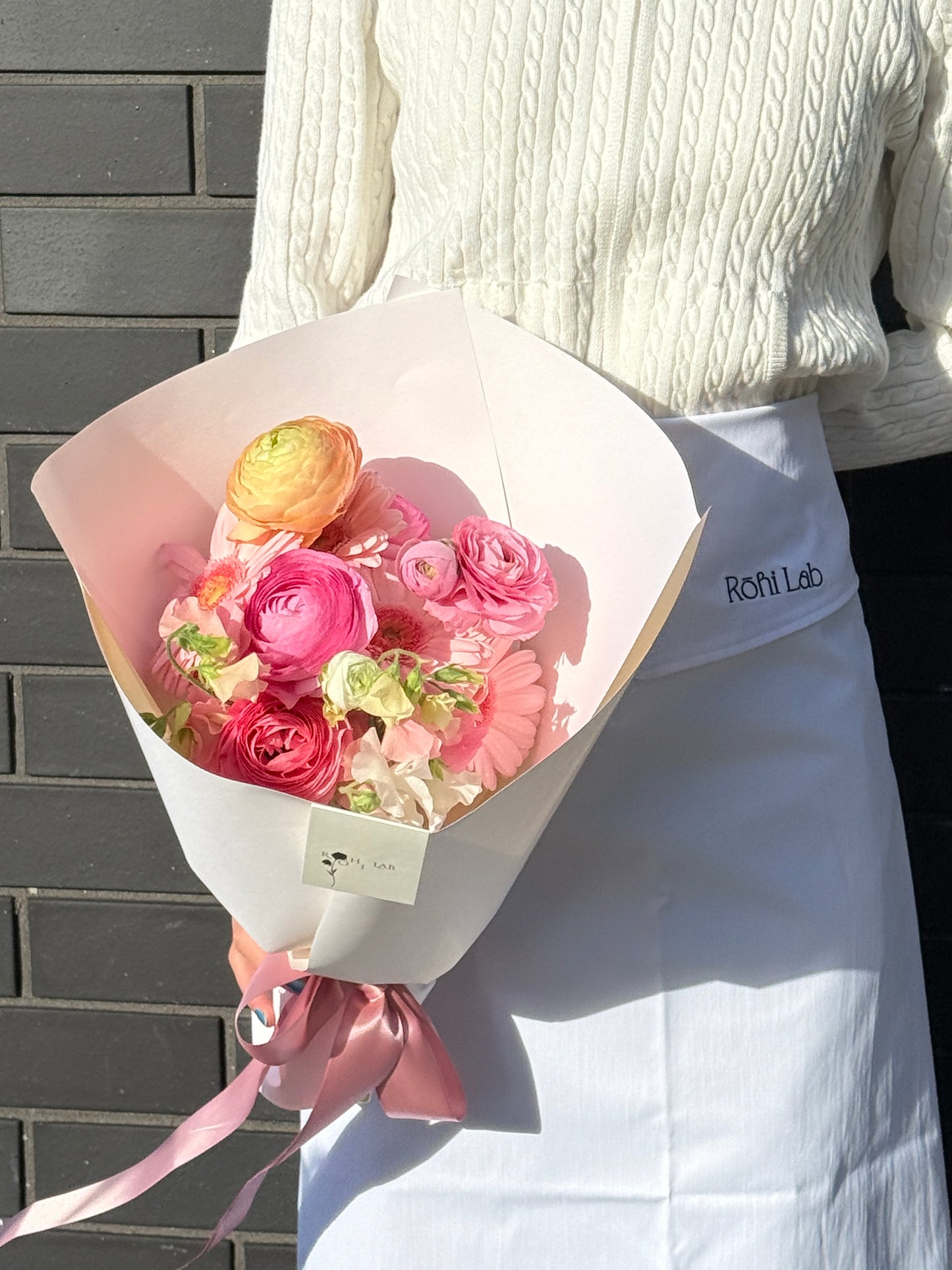 Petal Ballet seasonal ranunculus bouquet in soft pink tones