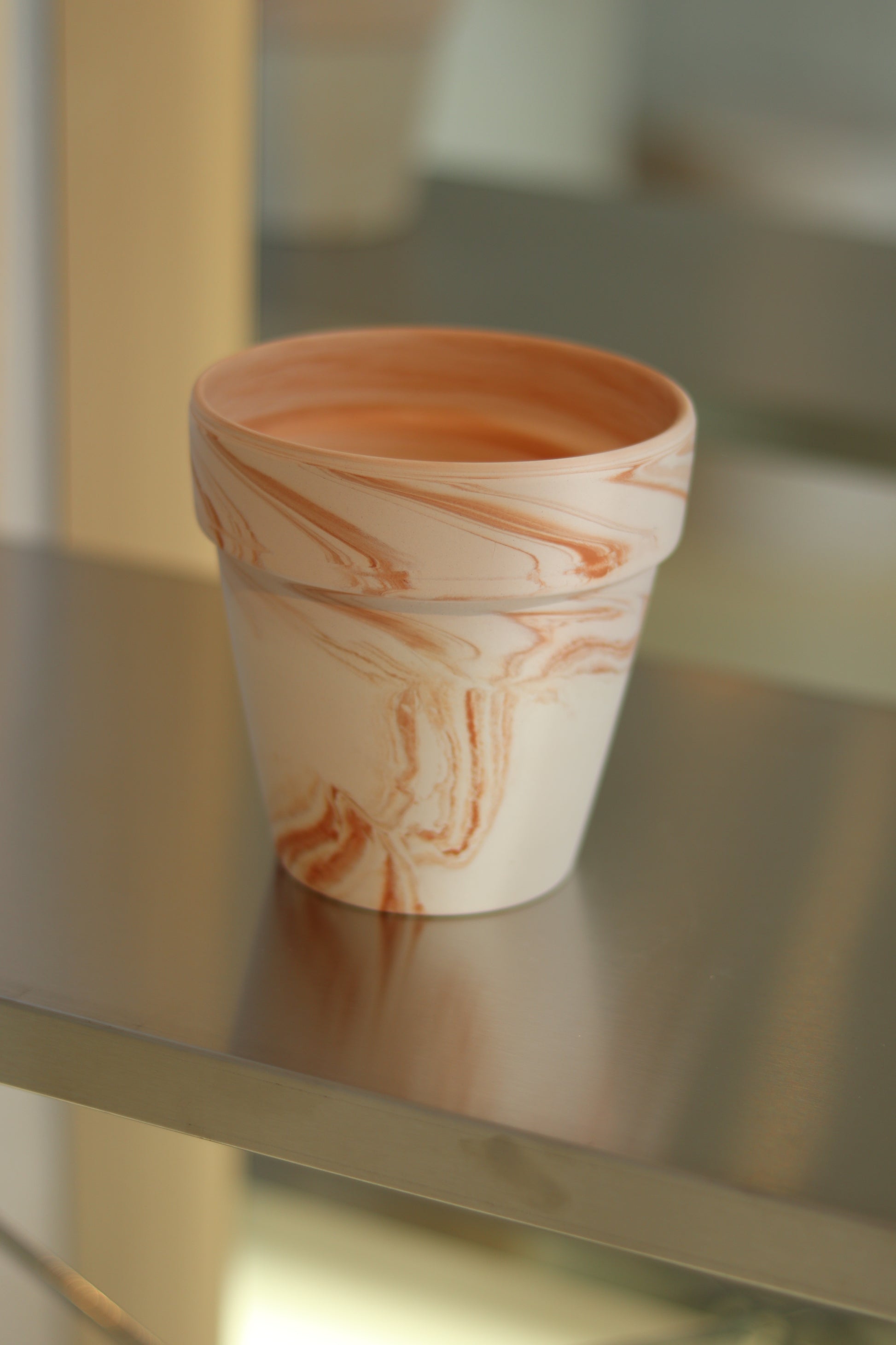 Macchiato ceramic planter with soft white and red clay finish for indoor plants
