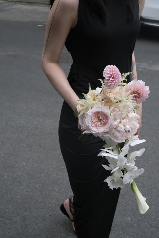 Blush pink and white bespoke bridal bouquet with orchids